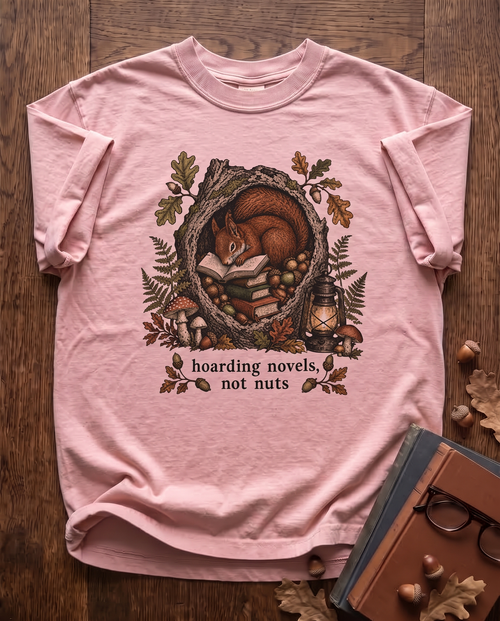 Hoarding Novels, Not Nuts - Blossom pink Comfort Colors tee, styled flat lay