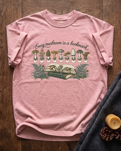 Every Mushroom Is a Bookmark - Blossom pink Comfort Colors tee, styled flat lay