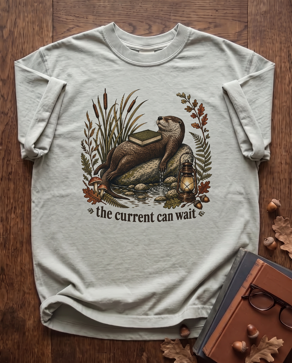 The Current Can Wait - Bay sage green Comfort Colors tee, styled flat lay